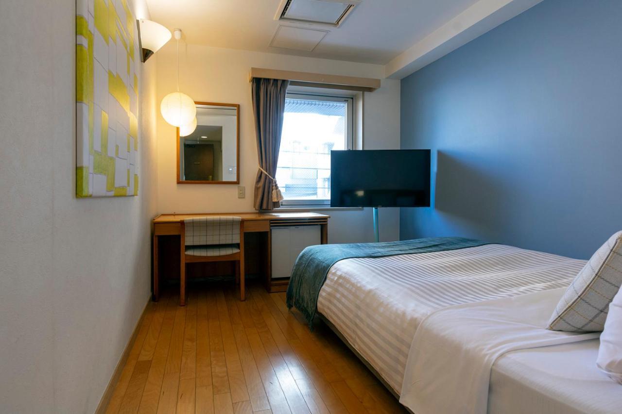 Hotel Toms Tokio Buitenkant foto