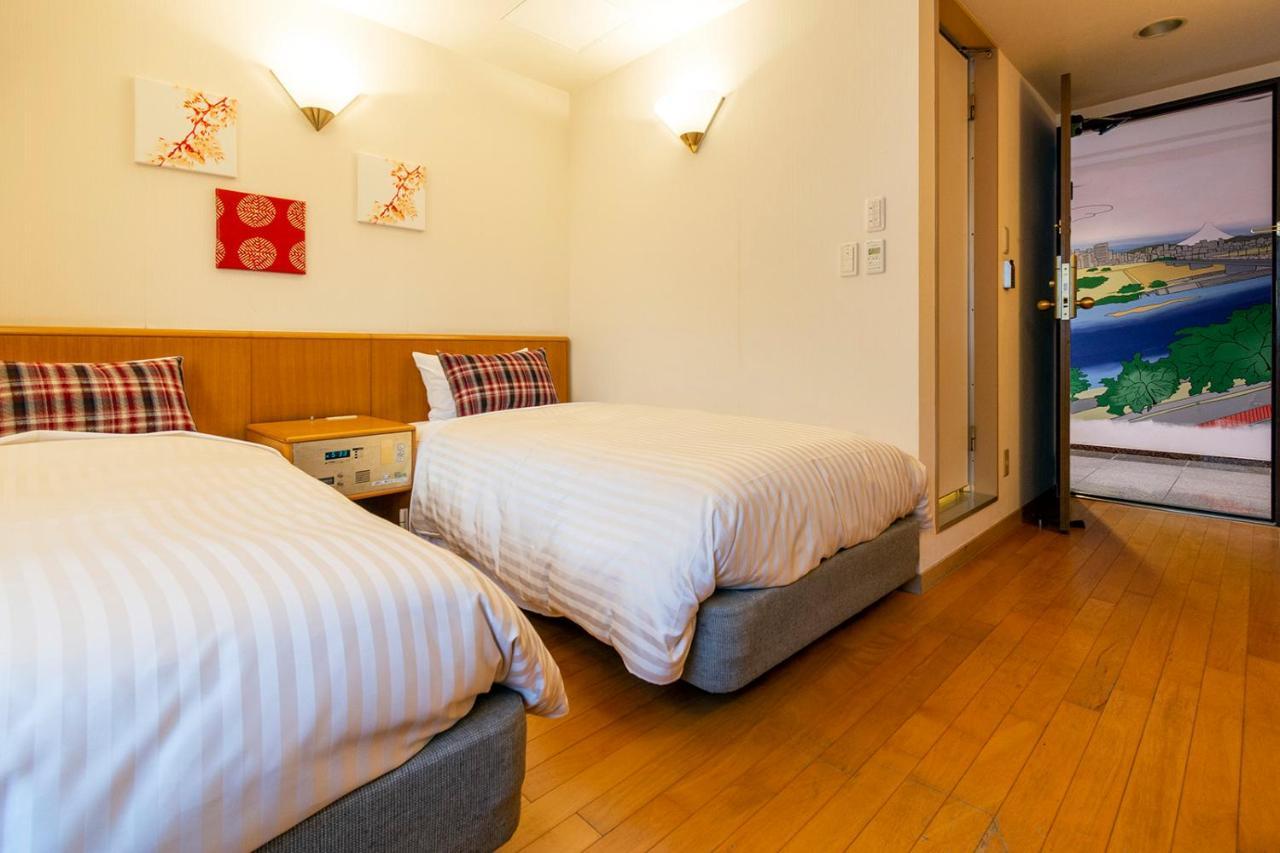 Hotel Toms Tokio Buitenkant foto