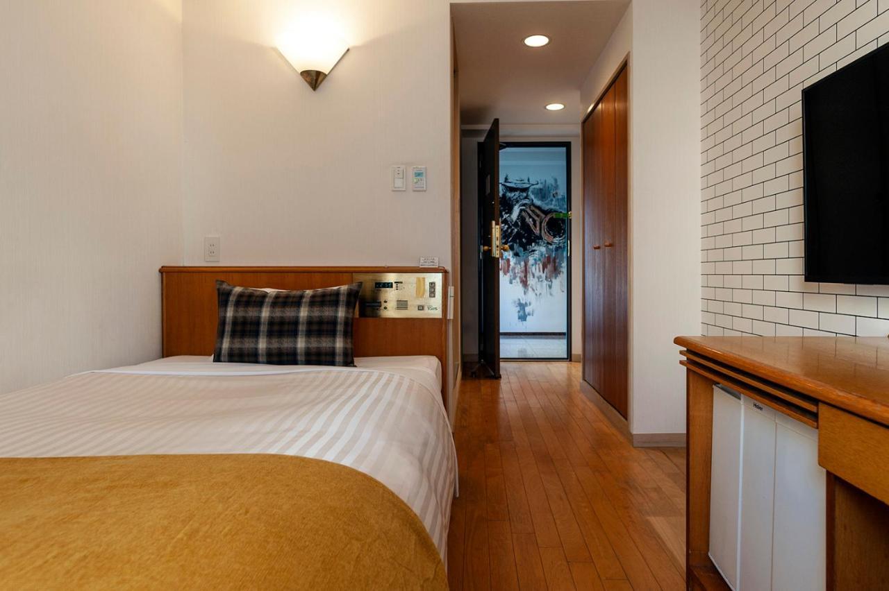 Hotel Toms Tokio Buitenkant foto
